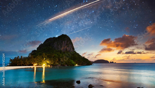 綺麗な南の島に流れ星が降りそそいでいる夕方の風景