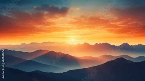 sunset over a majestic mountain range, with the peaks silhouetted against the fiery sky. 