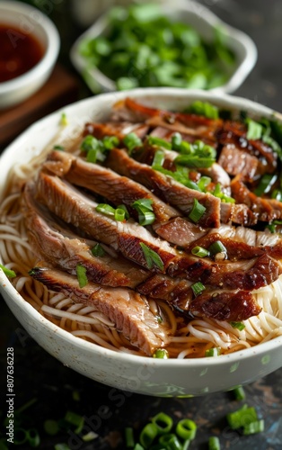 A bowl of Chinese goose meat rice noodles, exuding a mouthwatering texture

