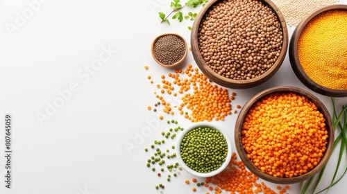 a diverse colorful and healthy selection of legumes including lentils, peas and beans and etc.