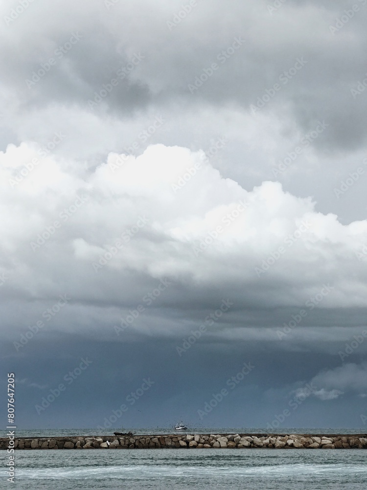 Seaside view of bay, sea and clouds in South of Italy Seaside view of bay, sea and clouds in South of Italy