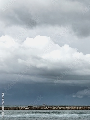 Seaside view of bay, sea and clouds in South of Italy