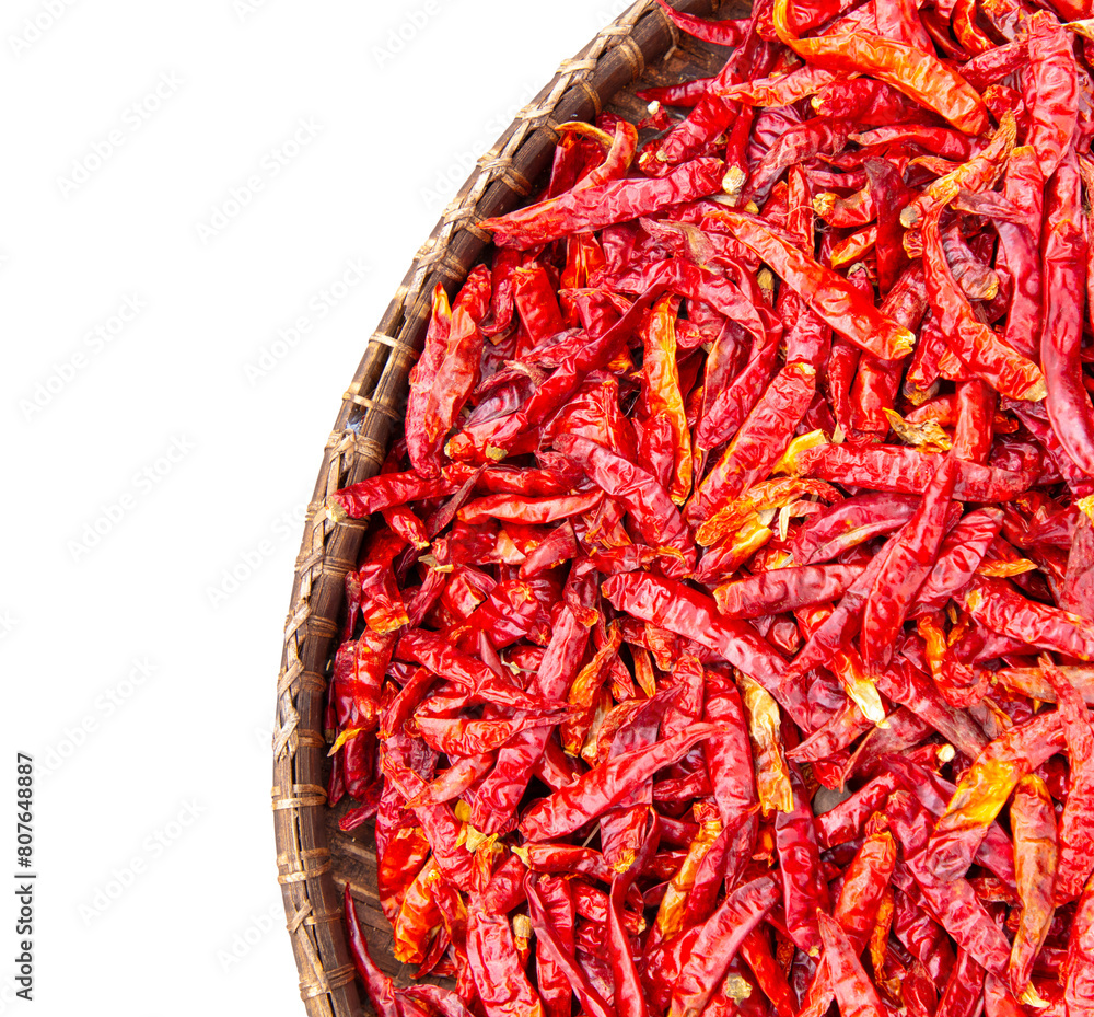 Red chili peppers in a basket isolated white background Red chili peppers in a basket isolated white background