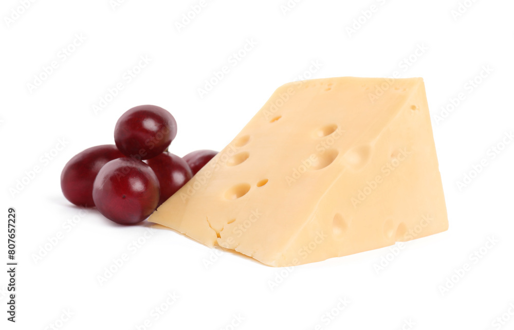 Piece of delicious cheese and grapes isolated on white Piece of delicious cheese and grapes isolated on white