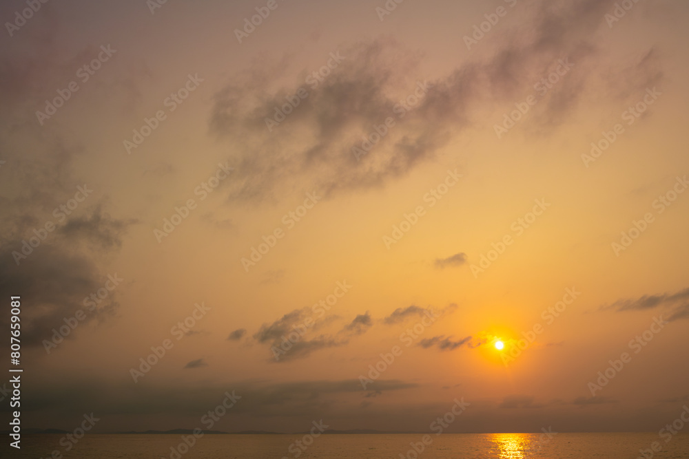 Sea view for summer vacation concept Nature of the summer beach and sea with soft sunlight. hitting the sand The sea sparkles against the sunset sky. Sea view for summer vacation concept Nature of the summer beach and sea with soft sunlight. hitting the sand The sea sparkles against the sunset sky.