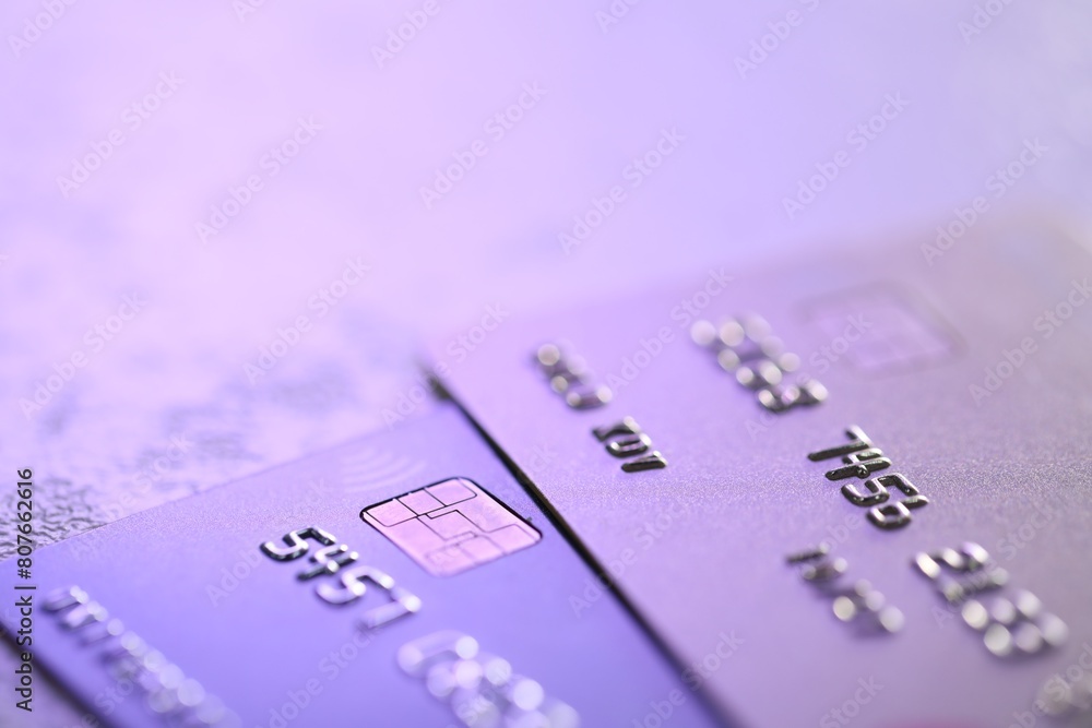 Plastic credit cards on table, closeup view. Color toned Plastic credit cards on table, closeup view. Color toned