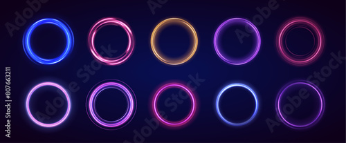 Set of neon blurry light circles at motion . Vector swirl trail effect. Abstract vector fire circles, sparkling swirls and energy light spiral frames.	
