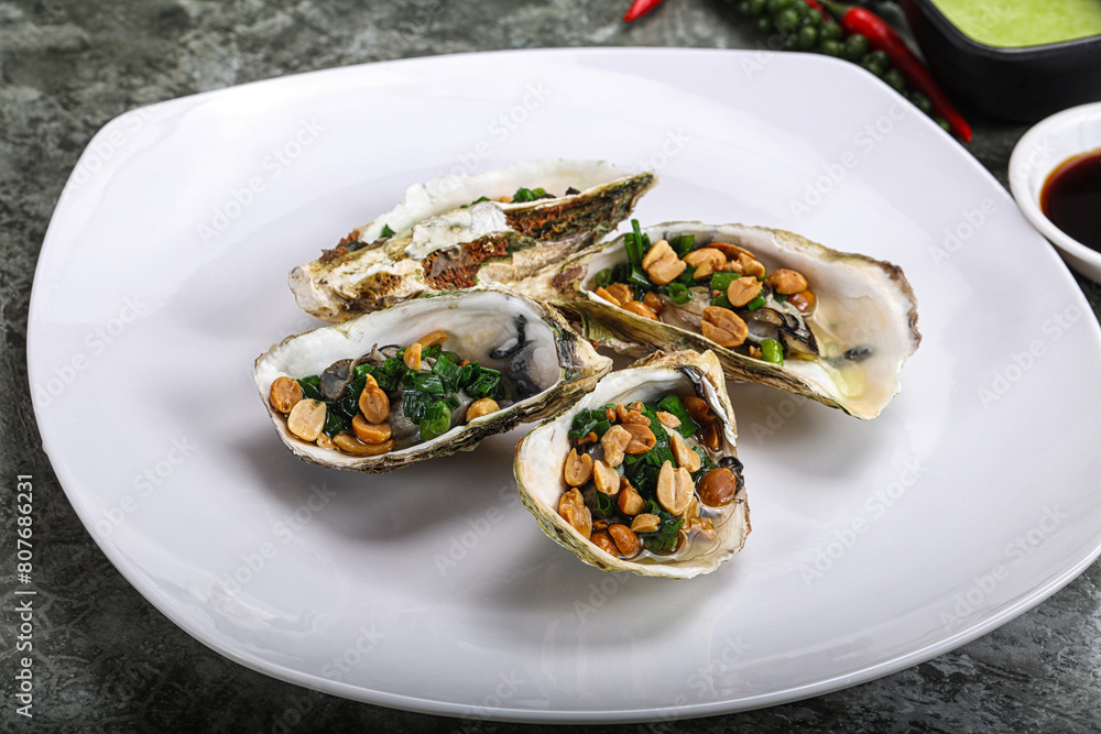 Open half oysters with green onion Open half oysters with green onion