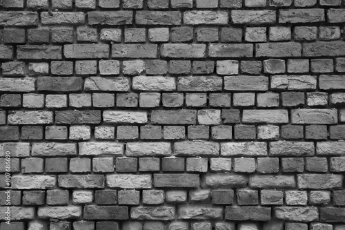 gray wall made of old brick close-up