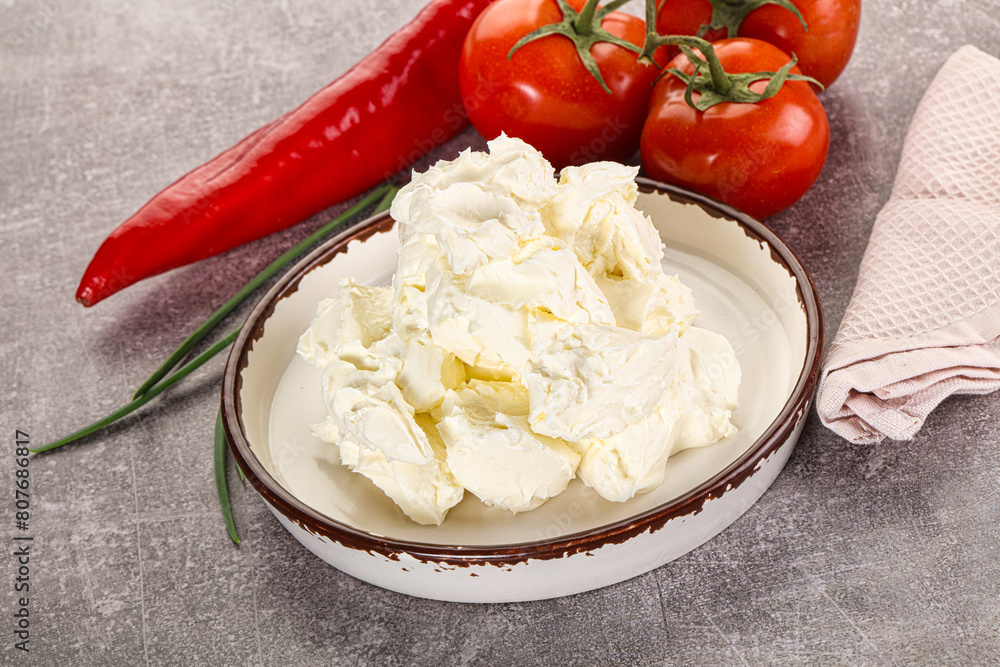 Soft Philadephia cheese in the bowl Soft Philadephia cheese in the bowl