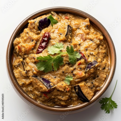 Vibrant bowl filled with Baingan Bharta curry, topped with fresh cilantro