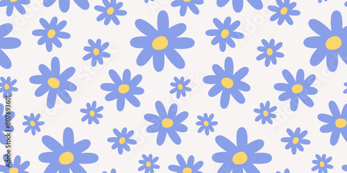 Groovy flowers seamless pattern. Naive hand drawn blue daisy on beige background