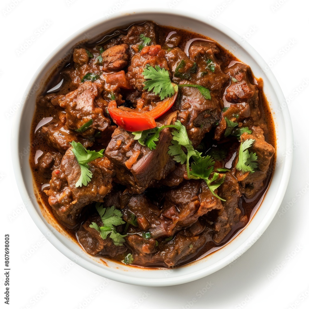 Bowl brimming with Indian Lamb Vindaloo, mixed with fresh vegetables in a creative masterpiece Bowl brimming with Indian Lamb Vindaloo, mixed with fresh vegetables in a creative masterpiece