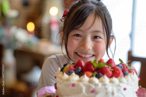 Japanese girl with birthday cake