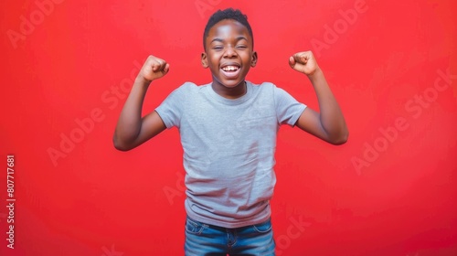 Joyful Boy Celebrating Victory photo