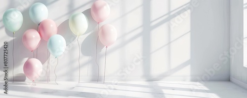 A beautiful pastel-colored balloons in a white room
