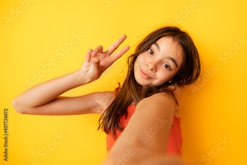 Girl taking self portrait with mobile phone