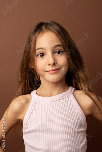 Charming girl looking at camera