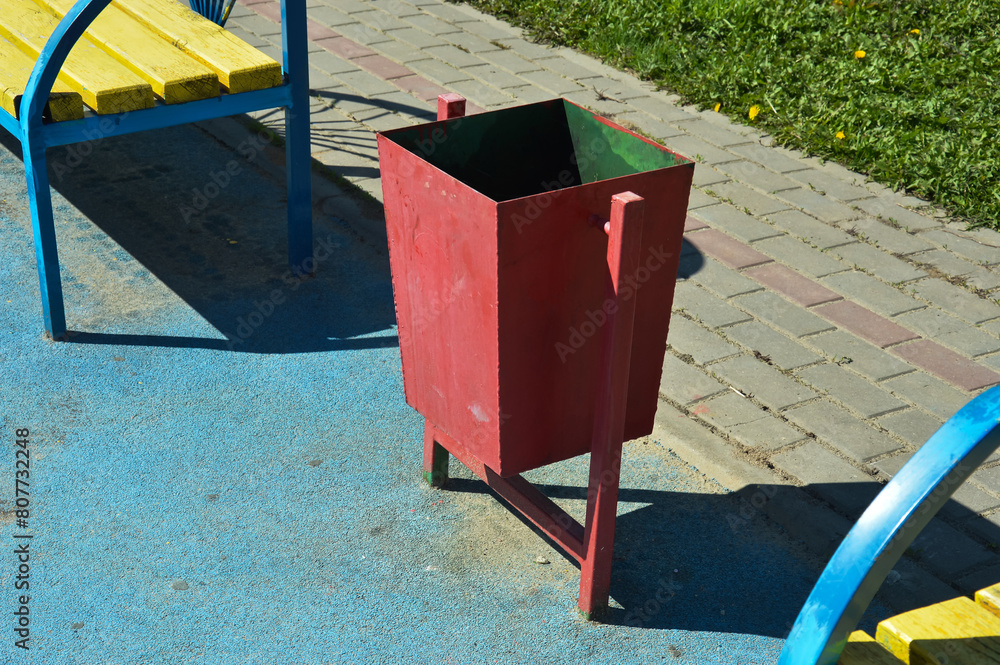 garbage can on the street of the city, pollution of nature. background for the design. garbage can on the street of the city, pollution of nature. background for the design.