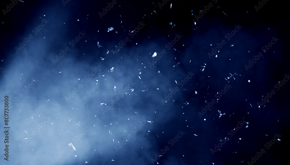 Obraz premium Realistic isolated blue fire effect particles embers on background . Smoke fog misty texture overlays.