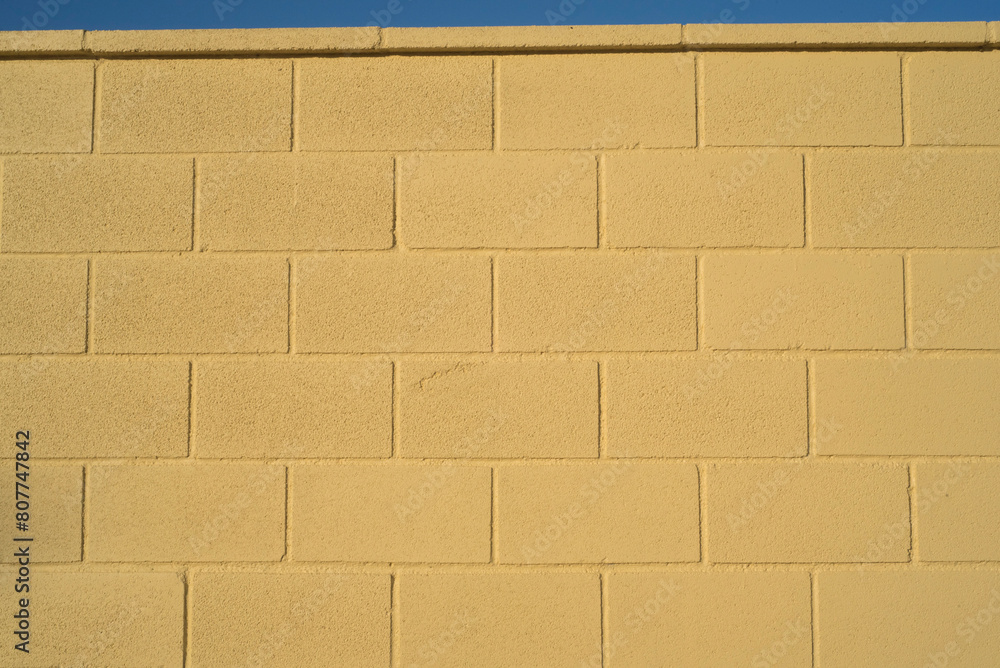 Yellow paint concrete block wall Yellow paint concrete block wall