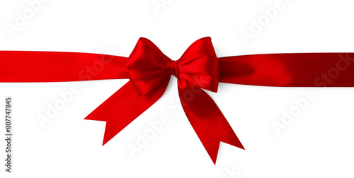Red satin ribbon with bow isolated on white, top view