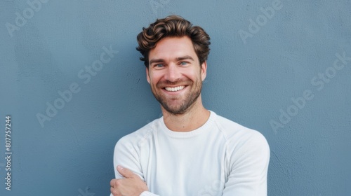 Smiling Man in White Shirt photo