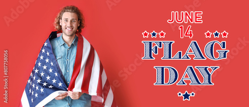 Happy young man with USA fl...