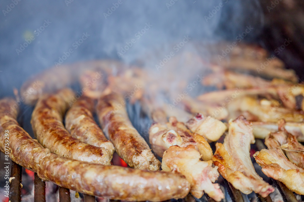 meat mix on the grill while it is cooked.