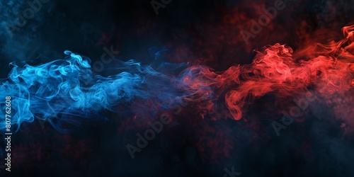 The image shows two streams of smoke, one blue and one red, flowing next to each other on a black background. photo