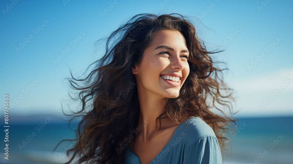 Smiling woman with windy curly hair Concept of people, travel and living, lifestyle in leisure. Nature blurred background Smiling woman with windy curly hair Concept of people, travel and living, lifestyle in leisure. Nature blurred background