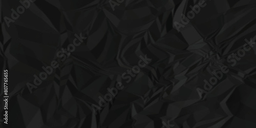 Dark black crumpled paper texture background. black crumpled and top view textures can be used for background of text or any contents.	