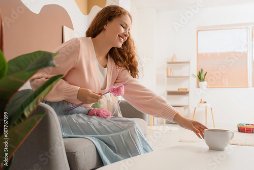 Young woman with knitting y...