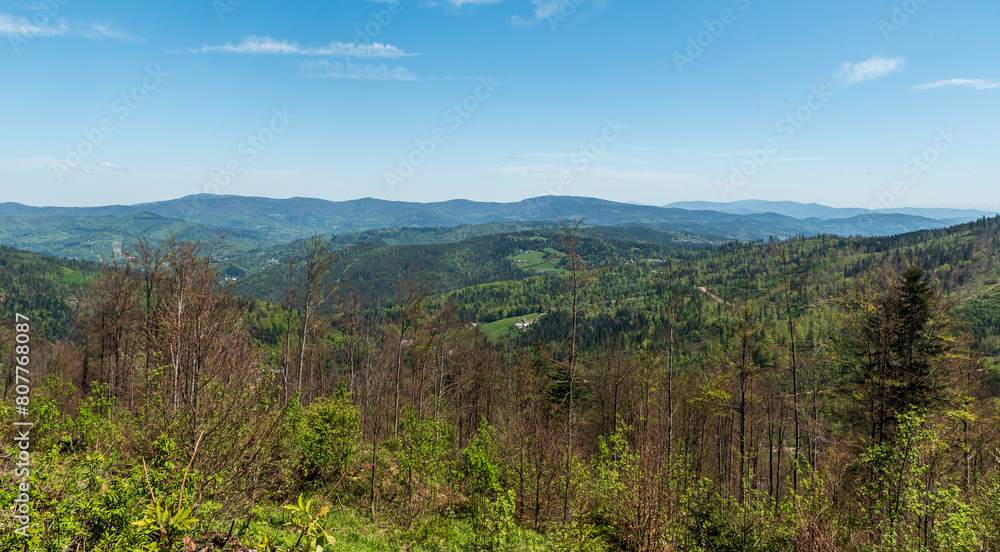 View from hiking trail to Wielki Stozek hill in Beskid Slaski mountains on polish - czech borders View from hiking trail to Wielki Stozek hill in Beskid Slaski mountains on polish - czech borders