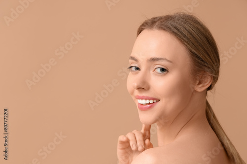 Beautiful young woman on br...