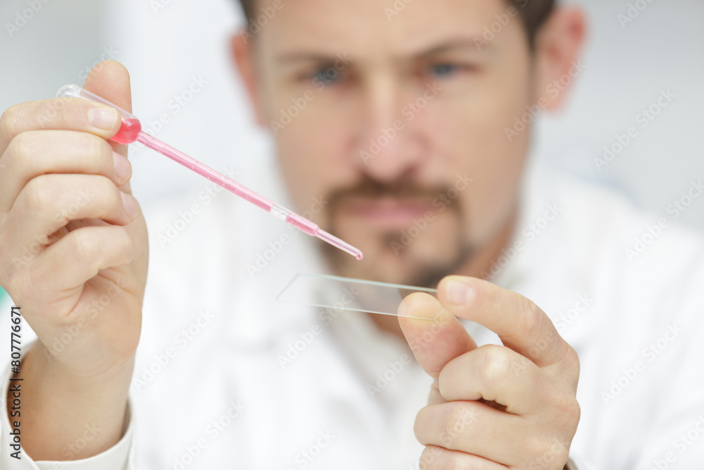 man scientists are testing and analyzing chemicals man scientists are testing and analyzing chemicals