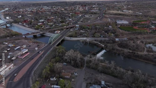 Early morning 4k aerial footage of downtown Pueblo, Colorado over I25 with mountains in the distance.