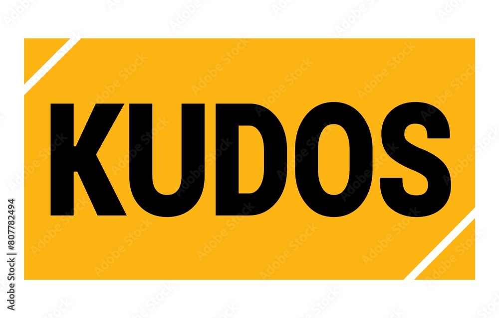 KUDOS text written on yellow-black stamp sign.