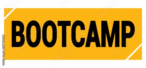 BOOTCAMP text on yellow-black grungy stamp sign. photo