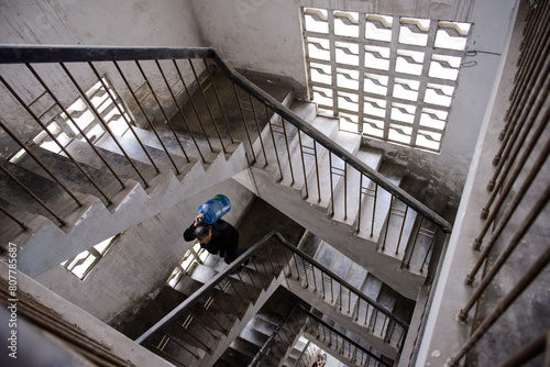 Carrying Water Up Stairs