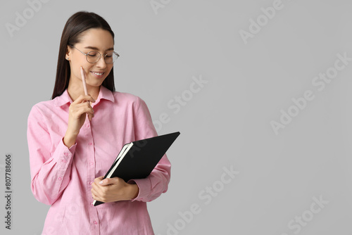 Young female writer with no...
