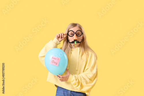 Little girl in funny disgui...