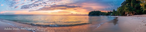 Panoramic Tropical Beach Sunset with Vibrant Skies and Serene Waters