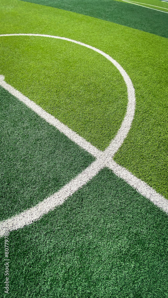 Artificial grass football field surface See the circle in the center of the field.