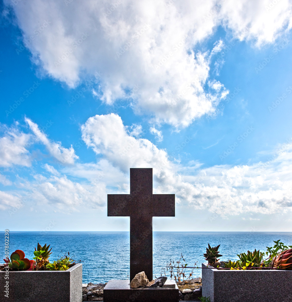 Abstract image with a cross on the background of the sea and the sky