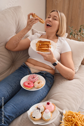 Beautiful woman with eclair...