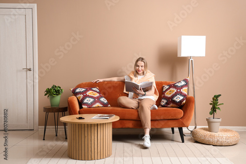 Young woman relaxing on a c...