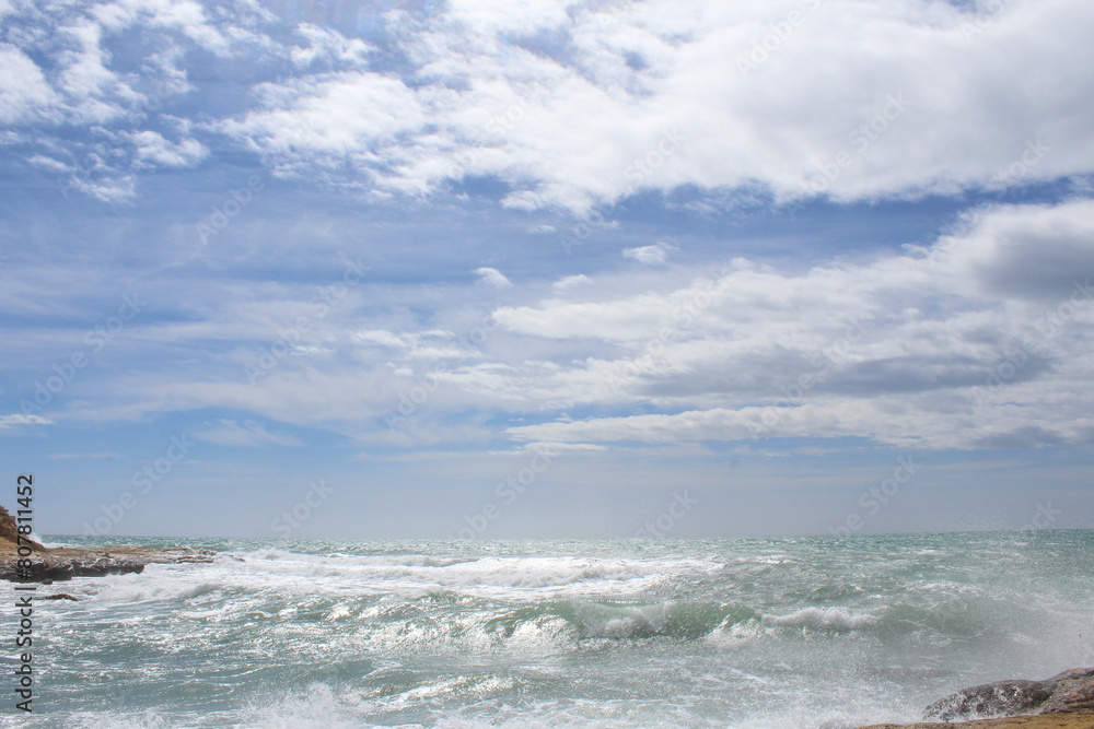 natural background of sea sky and stones, beautiful view of Mediterranean coast in Spain, waves in the sea natural background of sea sky and stones, beautiful view of Mediterranean coast in Spain, waves in the sea