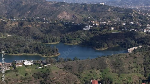 Hollywood Reservoir or Lake Hollywood in Santa Monica Mountains - rising aerial reveal
