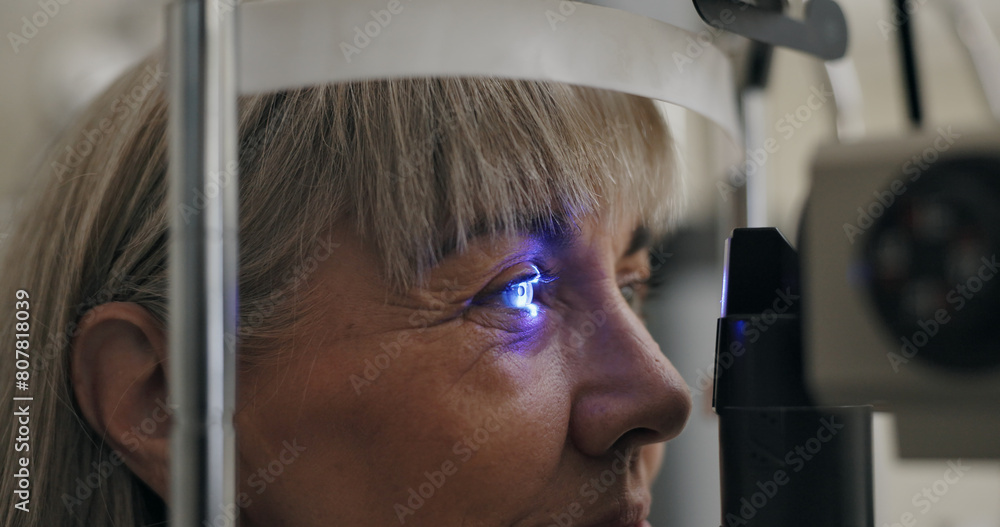 © peopleimages.com - Patient, slit lamp or ophthalmology as eye test, medicine or optometry as healthcare technology. Mature woman, eyeball or light in glaucoma, exam or consultation to diagnose lens, cornea or myopia © peopleimages.com - Patient, slit lamp or ophthalmology as eye test, medicine or optometry as healthcare technology. Mature woman, eyeball or light in glaucoma, exam or consultation to diagnose lens, cornea or myopia